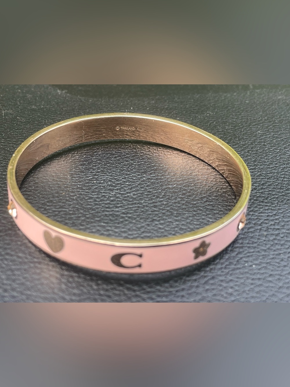 Coach pink enamel bangle